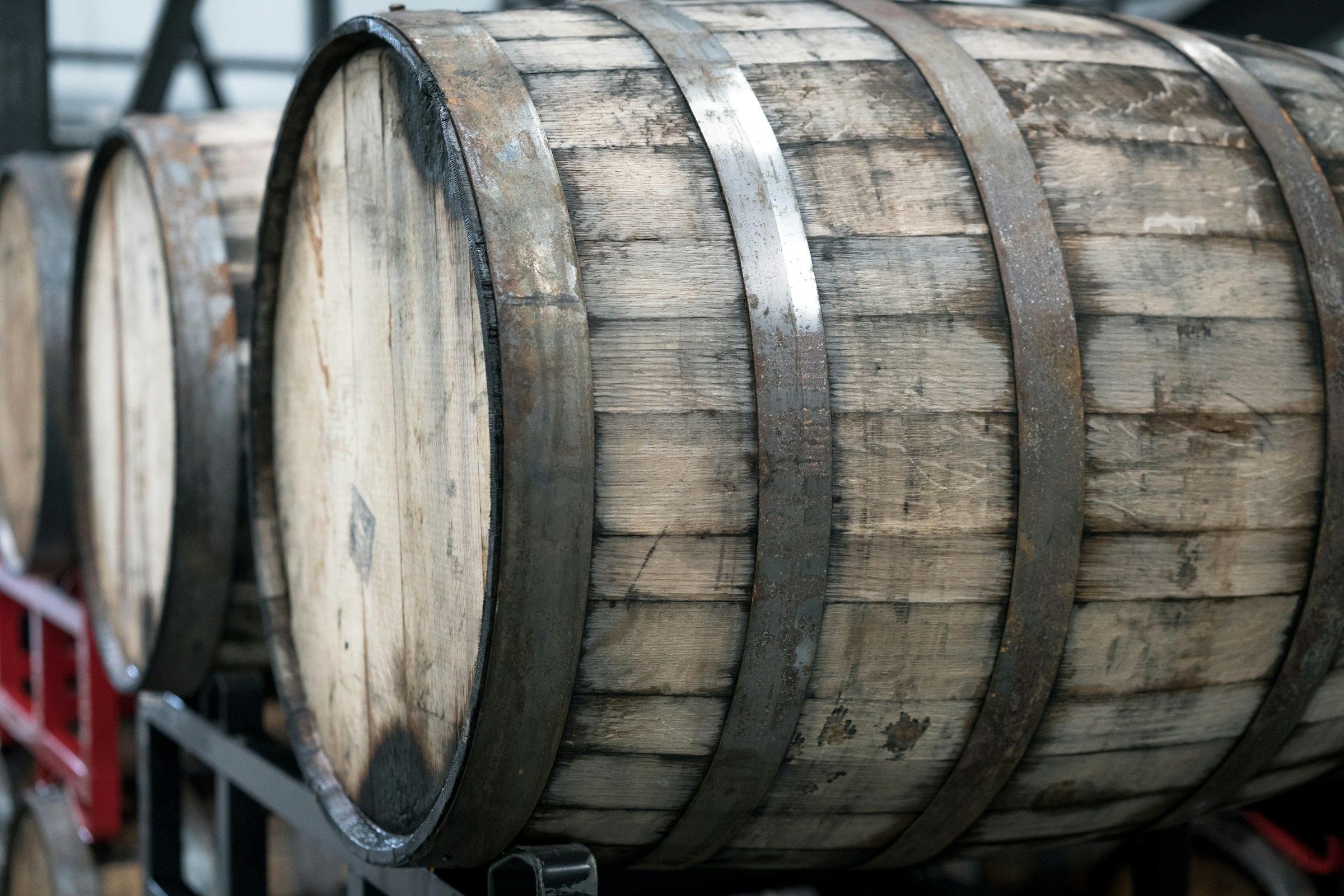 Oak bourbon barrel aging in a rickhouse